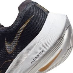 Nike Men's ZoomX Vaporfly Next % 2 Racing Shoe - Black/White/Metallic Gold Coin - Regular (D) 17 Nike Men's ZoomX Vaporfly Next % 2 Racing Shoe - Black/White/Metallic Gold Coin - Regular (D) -Men Shoes Store CU4111 001 PHSYD002 1500