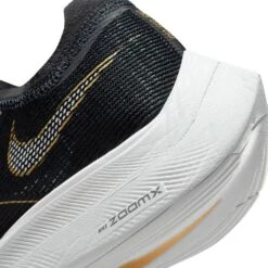Nike Women's ZoomX Vaporfly Next % 2 Racing Shoe - Black/White/Metallic Gold Coin - Regular (B) 17 Nike Women's ZoomX Vaporfly Next % 2 Racing Shoe - Black/White/Metallic Gold Coin - Regular (B) -Men Shoes Store CU4123 001 PHSYD002 1500